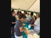 Volunteers worked to serve the hungry crowd.