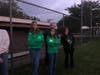 Holding green lights and wearing green, friends mourned Dylan Newman.