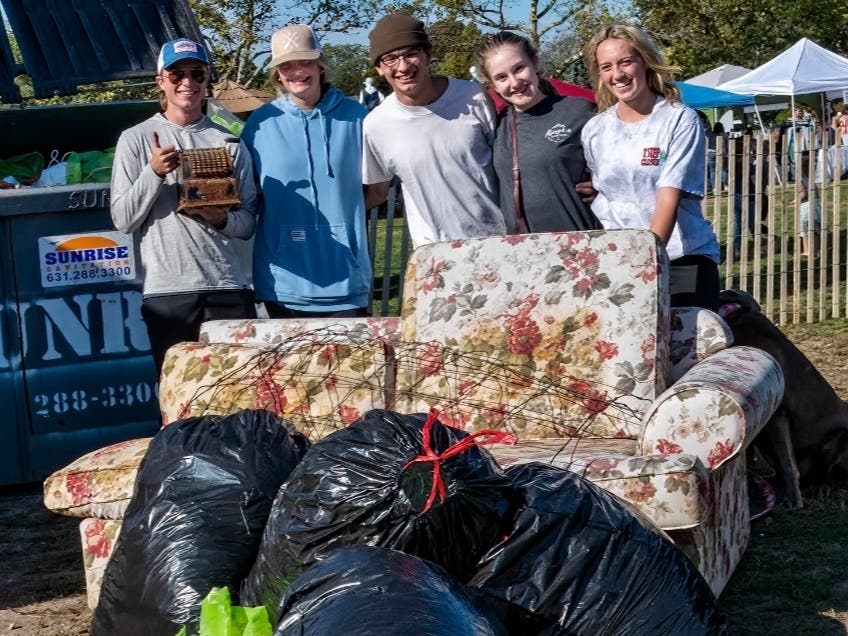 Those cleaning the beach picked up bags of trash — and even a couchn.