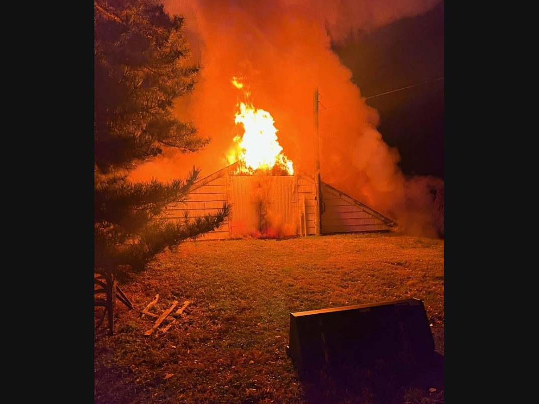 The fire ripped through the Jamesport building Saturday night, fire officials said.