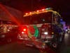 The mood was festive in Greenport Sunday for the annual Parade of Lights and Tree Lighting.