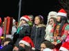 The mood was festive in Greenport Sunday for the annual Parade of Lights and Tree Lighting.