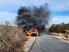 The car was engulfed in flames.