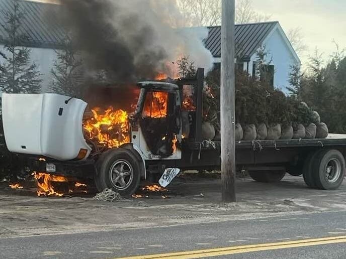 The truck was fully engulfed in flames.