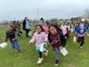 Children raced gleefully to find the eggs.