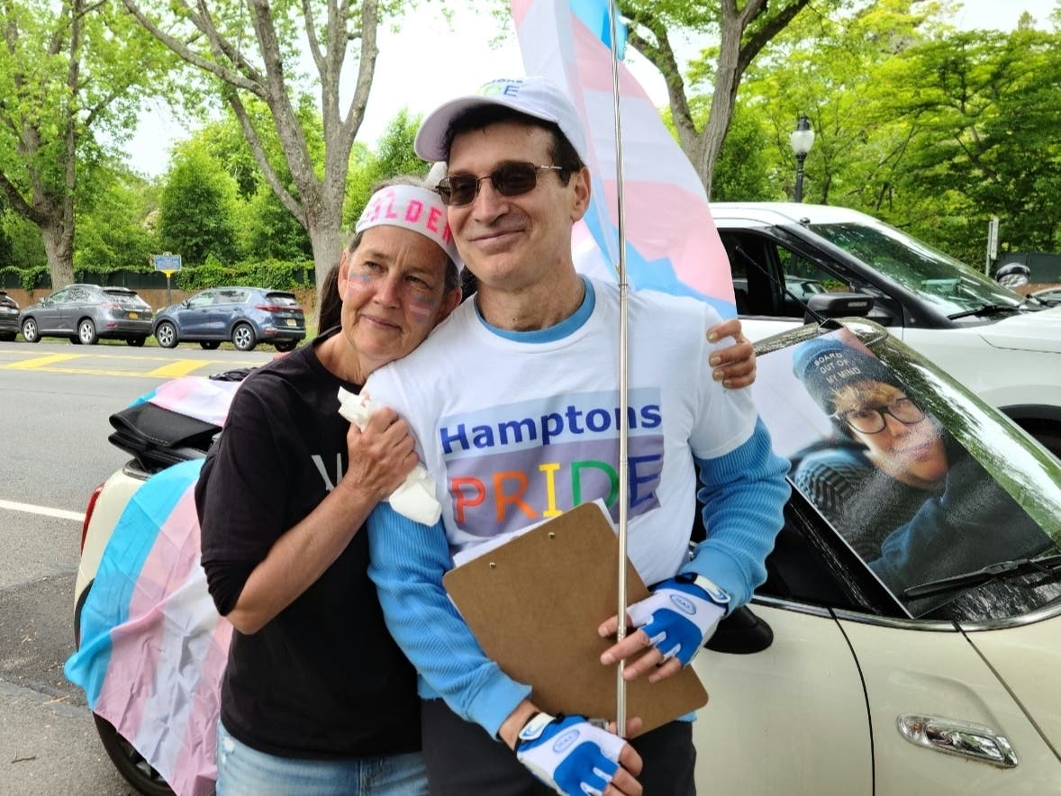 Hamptons Pride Parade organizer Tom House with Carla Josephson, who marched to honor the memory of her son Alden.