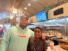Marc LaMaina and his son at his business, Burgercade.