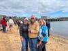 Tracey Orlando, executive director of the East End Seaport Museum & Marine Foundation, Dave Abatelli, and Diane Tucci, who organized the cardboard boat race.