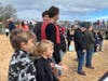 Crowds lined the beach near the dock in Greenport to watch the cardboard boat races.
