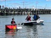 Despite the wind, teams paddled forward in the first-ever, fun-filled Greenport cardboard boat race.