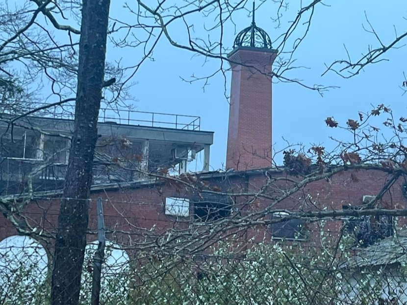 The tower at the Tesla Science Center stood as a beacon of hope after a fire Tuesday night.