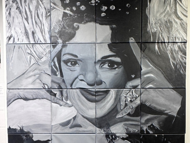 Students created the portrait using 16 panels, the district said.