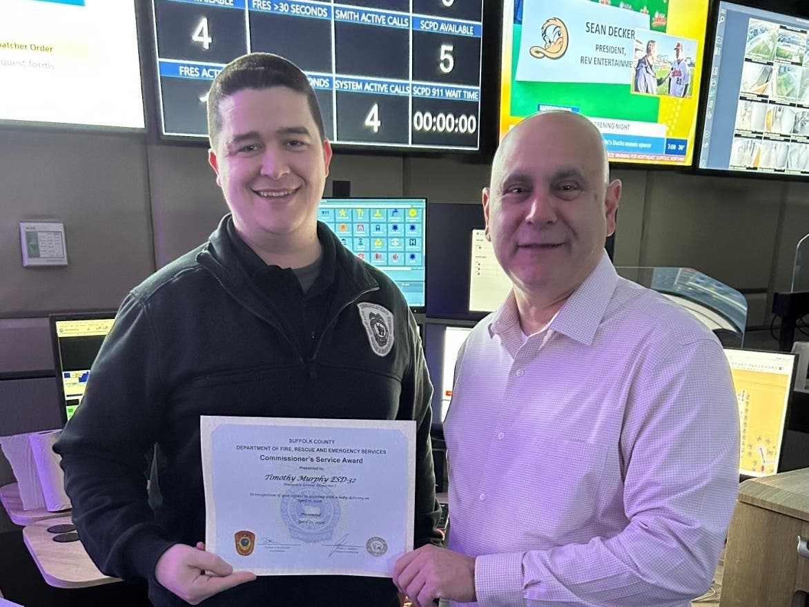 "In recognition of a job well done, Suffolk County Fire, Rescue and Emergency Services
 Commissioner Rudy Sunderman presented ESD Murphy with a certificate and congratulated him in recognition of this work."