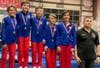 Coach Yury Vasilyev with the Darien YMCA Level 6 D1 boys gymnastics team. 
