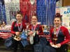 Darien Level 4 gymnasts Olivea Rosenbaum, Emma Bookless and Brook Wallace celebrated their success at YMCA States.