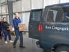 Griffin Health President and CEO Patrick Charmel loads up a van for Spooner House.