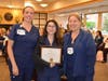Griffin Health Nurse Mackenzie Hebert, RN, of Oxford, CT, center, poses with fellow Griffin nurses Jessica Schepp, RN, left, and Denise Lauer, RN, after receiving the Marie Santini Perioperative Nursing Excellence Award.