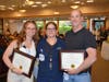 Griffin Health Nurses Stephanie Murphy, RN, of Shelton, left, and Sean Remson, RN, of Newtown, received the Shirley Yale Nursing Scholarship Award from Nursing Professional Development Specialist Michele Derbyshire MSN, RN.