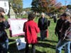 Chapter Regent Jeaneen Buchanan giving instructions on how to find the grave stones on the map.  Sally Finck, Pat King, Melissa Conti, Claudia Farkas and Linda Tidrick listening.