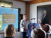 Lucinda Tomko presenting powerpoint: “Margaret Tucker Monnie Document Collection"