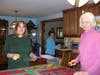 Marion Osborne and Claudia Farkas cutting patterns; Jeaneen Buchanan ironing the patterns, 12 Apr 2023