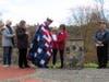Jeaneen Buchanan presenting Quilts of Valor Foundation Certificate to Joel Hurliman. Claudia Farkas, Marion Osborne, Linda Papp and Milt Harrigan look on.