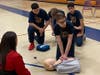St. George Students practicing CPR