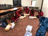 Bremen Child Care 2 students learning CPR in school at Bremen High School