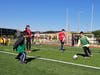 Local children, ages 5-12, practiced and scrimmaged with Tinley Park High School soccer coaches and players