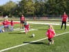 Local children, ages 5-12, practiced and scrimmaged with Tinley Park High School soccer coaches and players