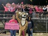 Oak Forest High School presented an $850.00 check to the American Cancer Society during halftime at the Pink Game for Breast Cancer Awareness.