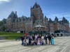 Tinley Park High School French students pose in front of Château Frontenac during their educational trip to Quebec City, Canada.