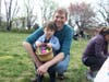 John Leupold accompanies his son, Dean, who had collected a basket full of eggs at the Easter egg hunt.