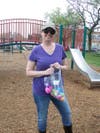 Tiffany Geist helps hide Easter eggs for a joint Easter egg hunt between three Annapolis communities. 