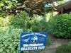 One of two signs in the yard of Otto Pfefferkorn. 