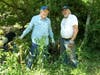 Frank Goetschius, left, and Steve McKerrow look at the area that McKerrow plans to use for his capstone project at the Watershed Stewards Academy. Goetschius is working to maintain his certification as a master watershed steward. 