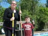 Melissa Tarawali and her helper, Carter VerMerris, put away items used during the annual swimming pool cleanup in Admiral Heights.