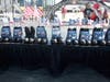 Seventeen pairs of boots lined the stage, symbolizing the lives of the service academy graduates who lost their lives on 9/11; 14 of whom were from the Naval Academy.