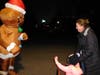 Emmi Geist and her mom, Tiffany, greet a special guest at the Santa Run in Admiral Heights.