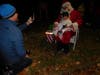David Lee takes photos of his son, Wyatt, with Santa.