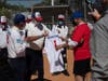 Mayor Kriesman was presented with  Kids and Kubs Game Jersey  #1 at the conclusion of the 50th annual Kids and Kubs Mayor's Game February 20 at North Shore Park in St Petersburg. Making the presentation is Jon Wilkinson, President of the Kids and Kubs