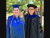 Class of 2021 Valedictorian Emma James Burke is congratulated by Tunxis professor Dr. Marie Clucas.  

