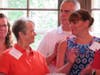 Foreground: Stephanie Clay of Special Stars Inc., and Stephanie Weber of Suicide Prevention Services of America share a smile. Background: Vicki Watts of Marklund and Greg Witek of Kendall County Community Food Pantry applaud for the other grantees. 