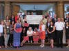 Grantees pose with several CFFRV Board and staff members - and the big check. This cycle's grantees were awarded a total of $379,767.