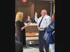 Eatontown Councilwoman Virginia East administering the oath of office to First Aid Squad 1st Lt. Kevin Kawas