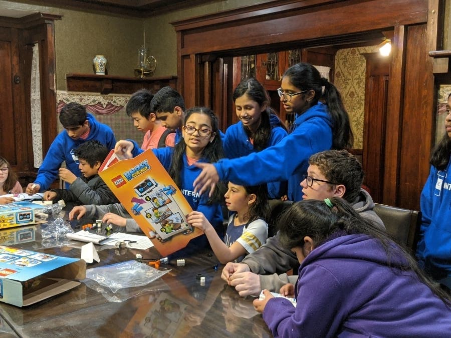 Quarry Lane students share their love for robotics at McHenry House. 