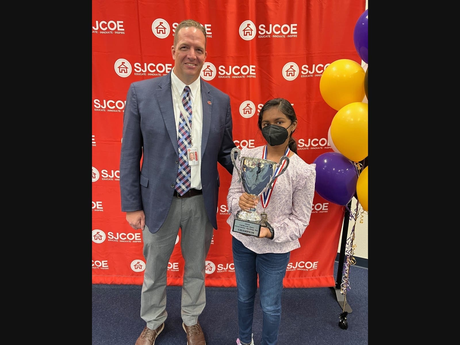Quarry Lane sixth grader, Shradha Rachamreddy, holds her trophy after winning the California State Spelling Bee. 