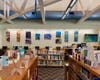 The long wall behind the circulation desk.