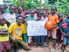 Villagers gather in Uganda to celebrate the Kobe and Gianna Memorial Well
