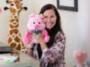 ELF Founder/CEO Mara James with the Piggie Bear plush